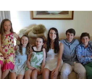 Sarah with her sisters and cousins